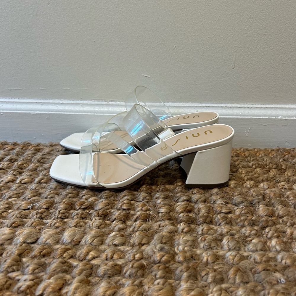 Clear and white heels